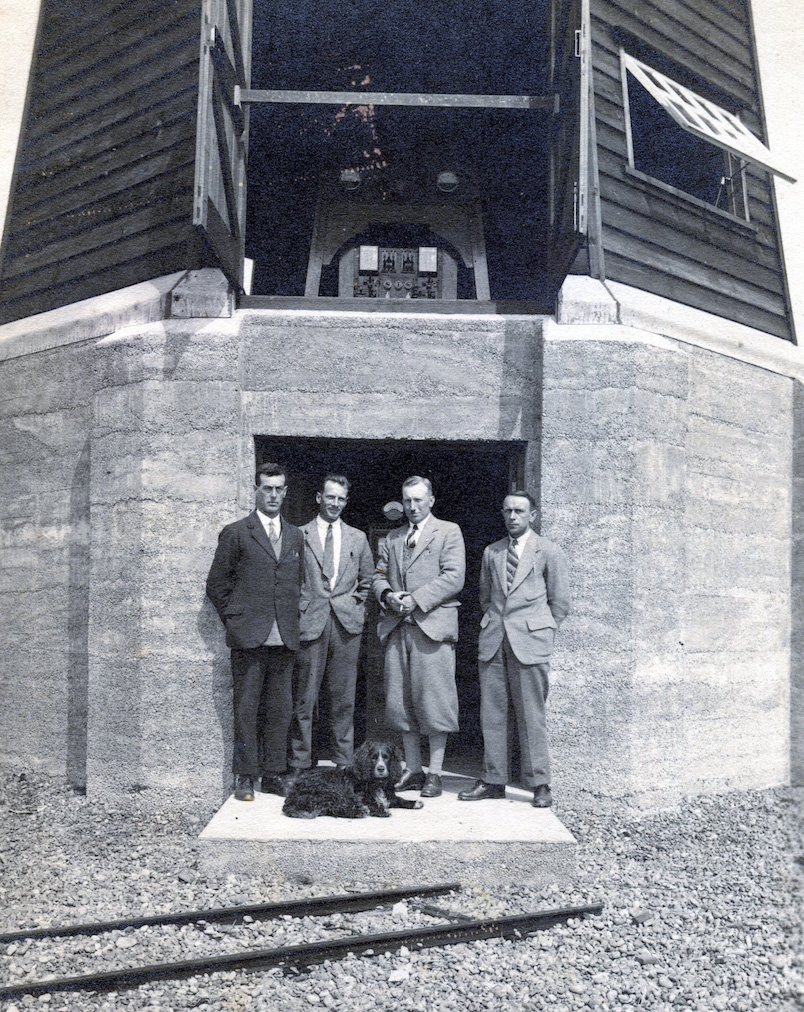 ​Can you help? Taken some time in the 1930s it shows four men and technical equipment in the Black Beacon. It also illustrates a hitherto unknown route of the narrow gauge railway on the Ness. Albert (Victor) Owen, second from the left, worked the Radio section of RAE Farnborough between the 1930s and 1950s. His family would love someone to identify the occasion, the men and even the dog! 